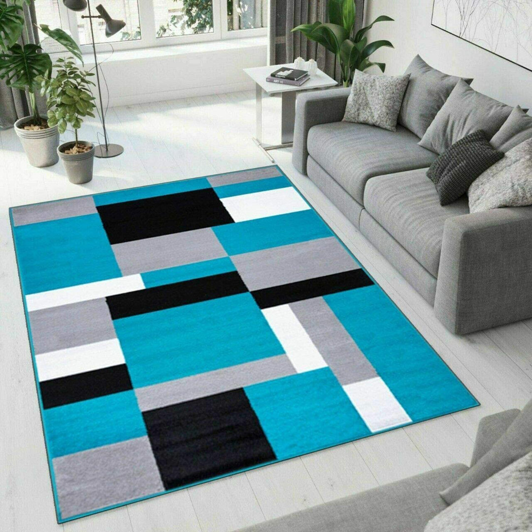 Ebern Designs Teppich Tarra in Türkis/Schwarz/Weiß