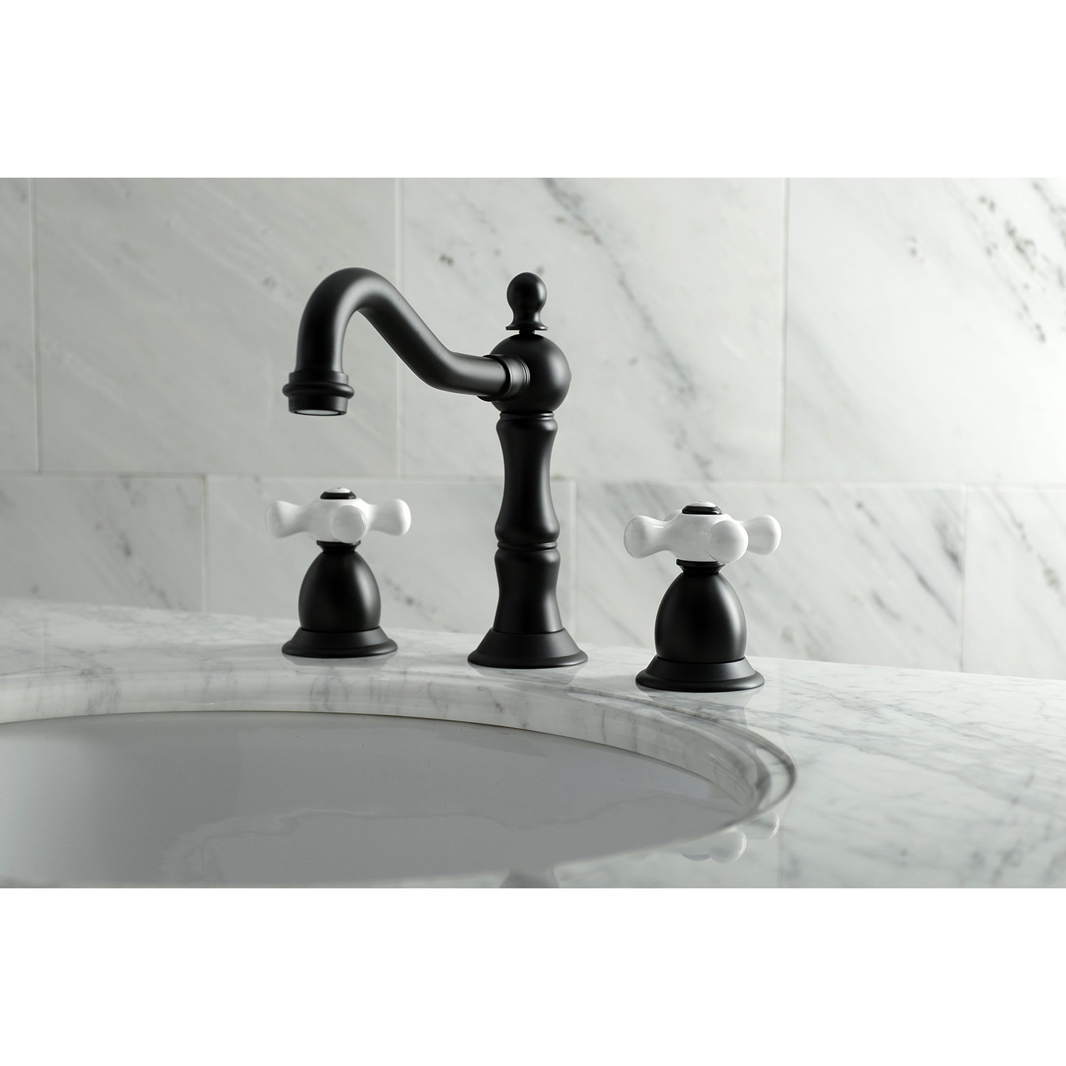 Kingston Brass Heritage Widespread Bathroom Faucet with Drain Assembly