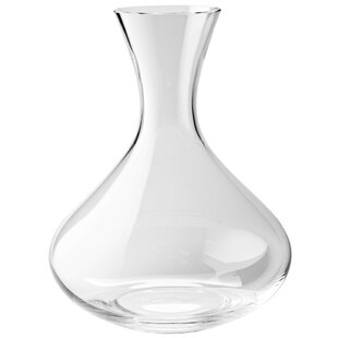 Holds a standard bottle wine Comes with AIOS drinks mat to place decanter on Quality Plastic Decanter/Carafe 800ml perfect for wine with lid Much safer than glass alternatives. Ideal for use at home and outdoors 