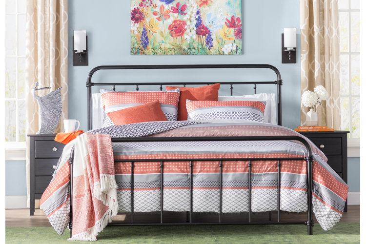 Bed with metal headboard