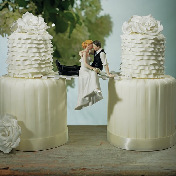White Porcelain Groom Holding Bride 6.25" tall wedding cake topper 