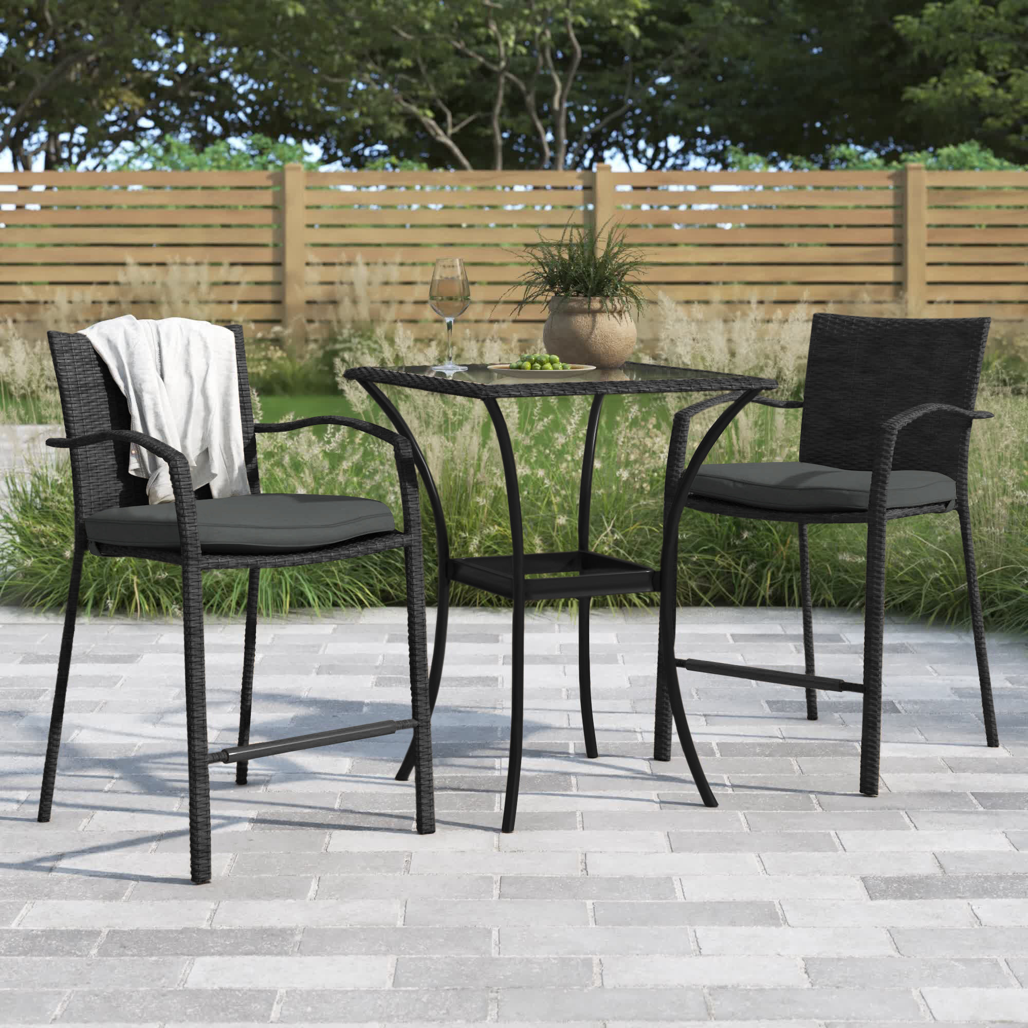 Image of Black bistro patio set with square table and two metal chairs