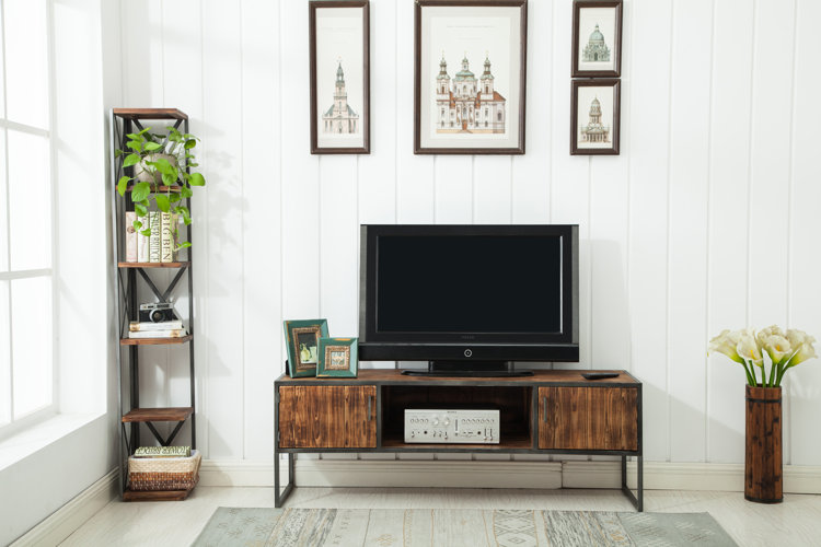 shiplap wall behind tv stand