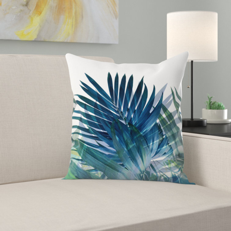 throw pillows with palm leaves