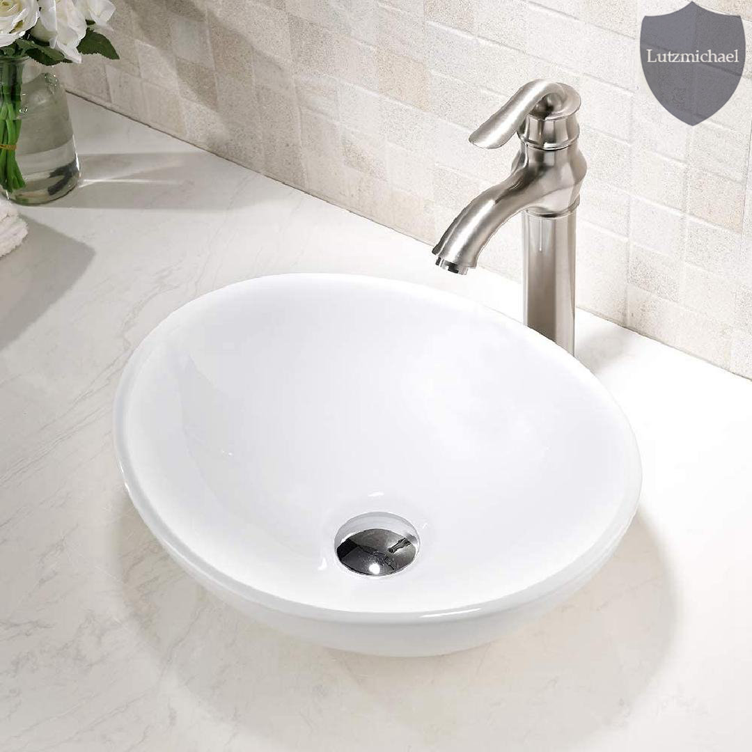Menggutong 13'' White Ceramic Oval Vessel Bathroom Sink with Faucet