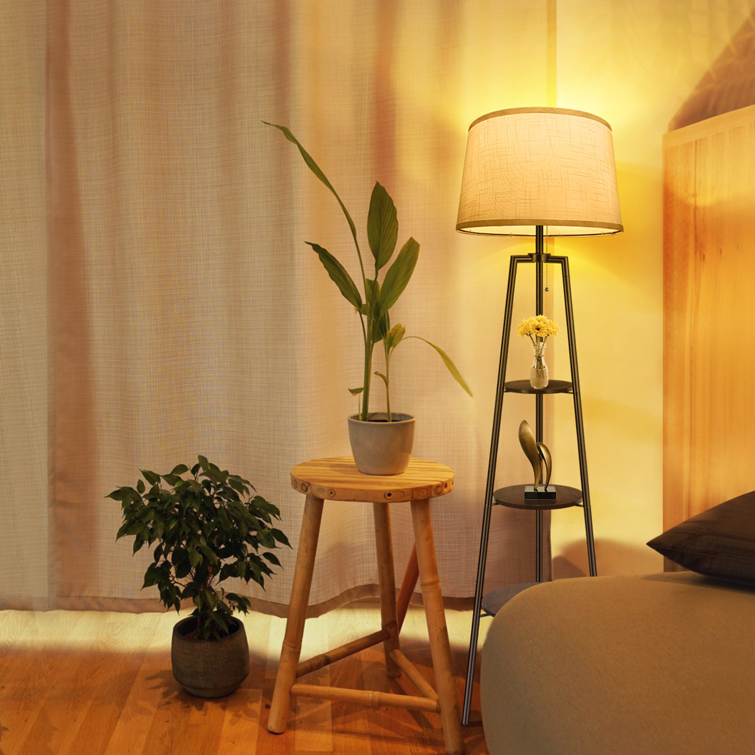 yellow wooden tripod floor lamp