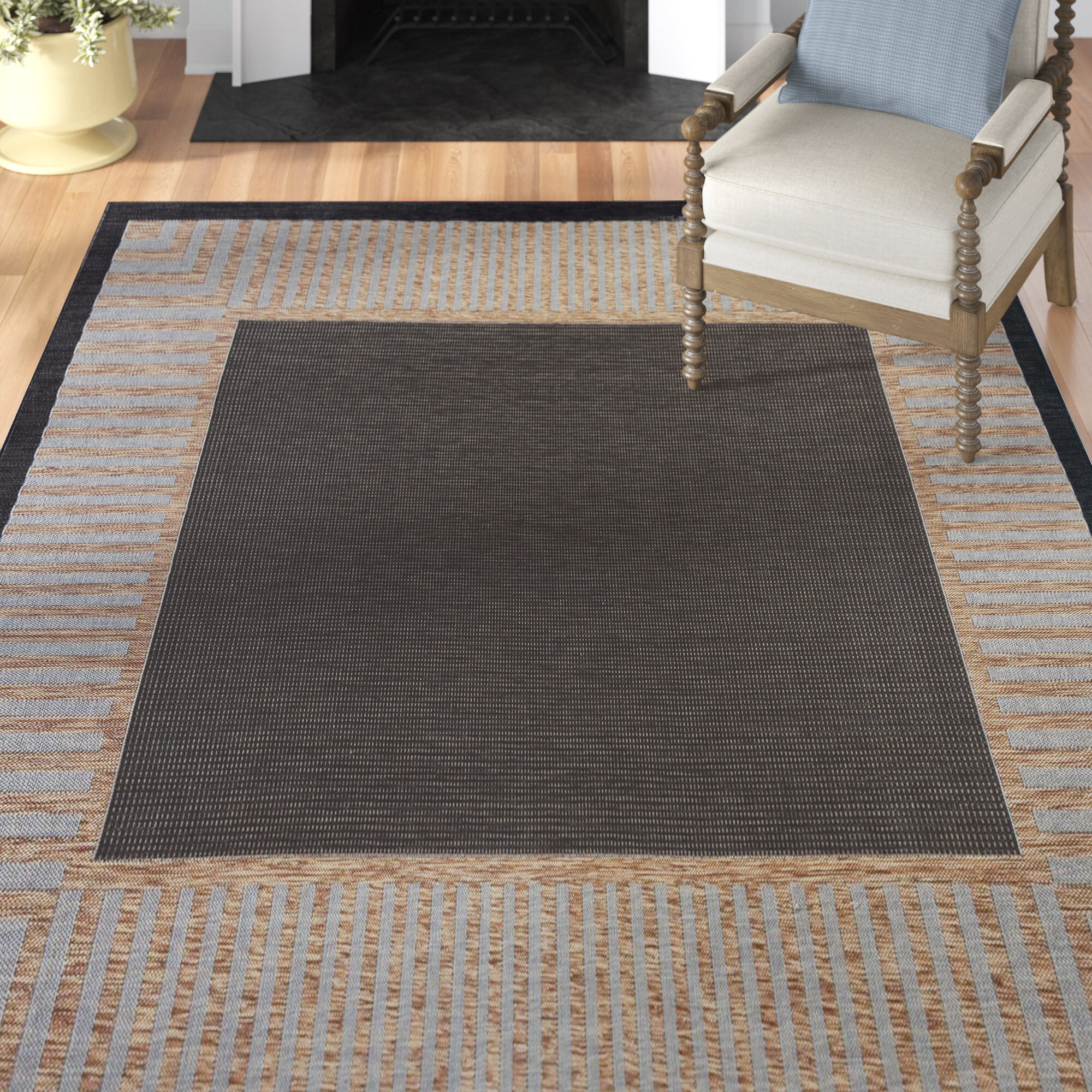 Three Posts™ Daponte Black/Gold Indoor / Outdoor Area Rug & Reviews