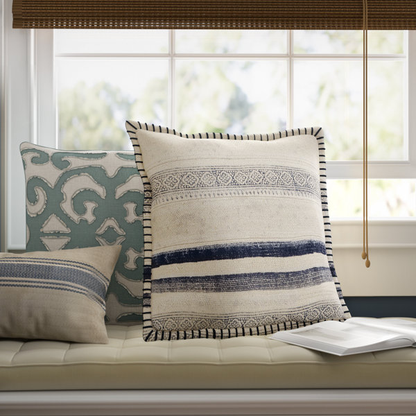 navy blue and cream pillows