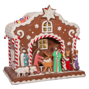 Raz Imports 6.5 Santa Gingerbread Snow Globe Plays Jingle Bells