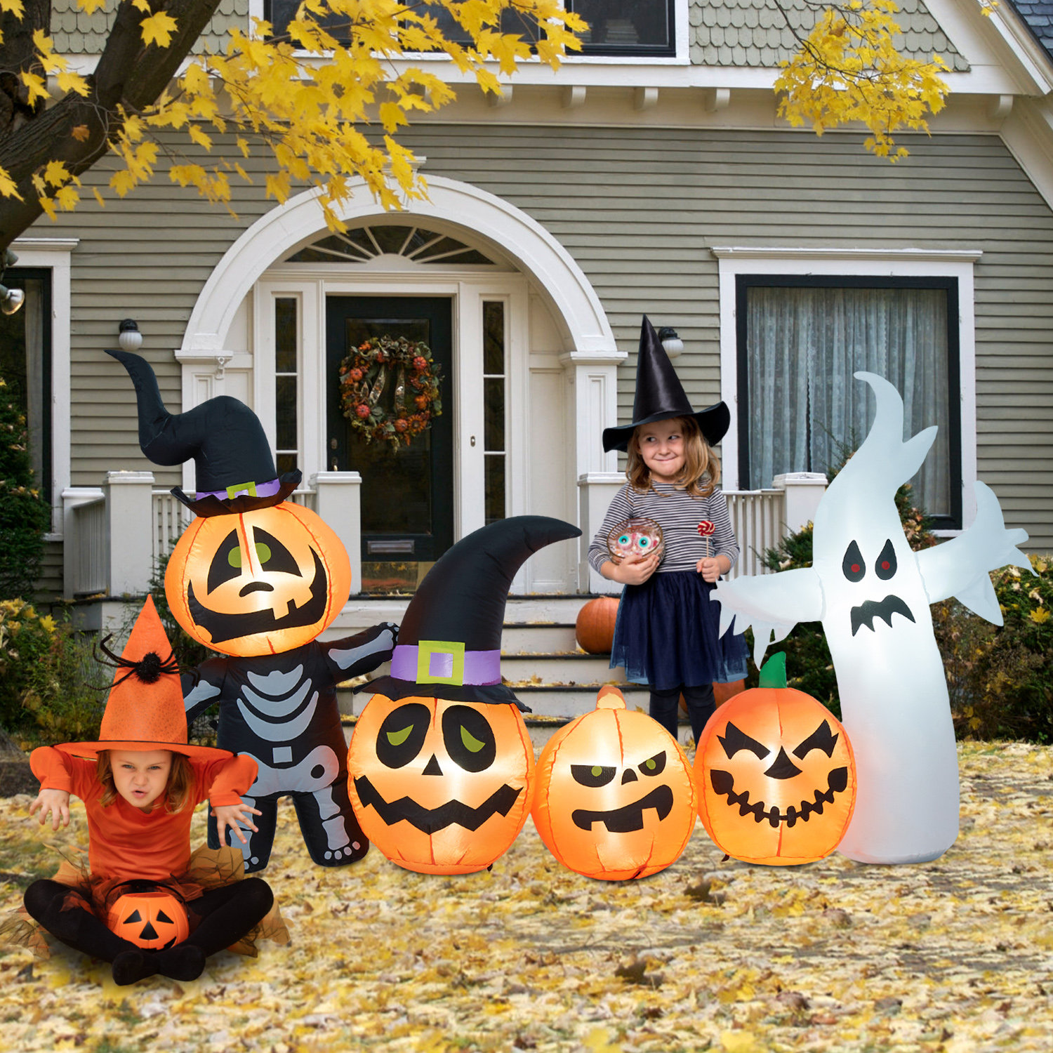 The Holiday Aisle® Pumpkin Family and Ghost Inflatable | Wayfair
